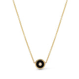 18k yellow gold mini compass pendant with black onyx and diamond by Retouvai