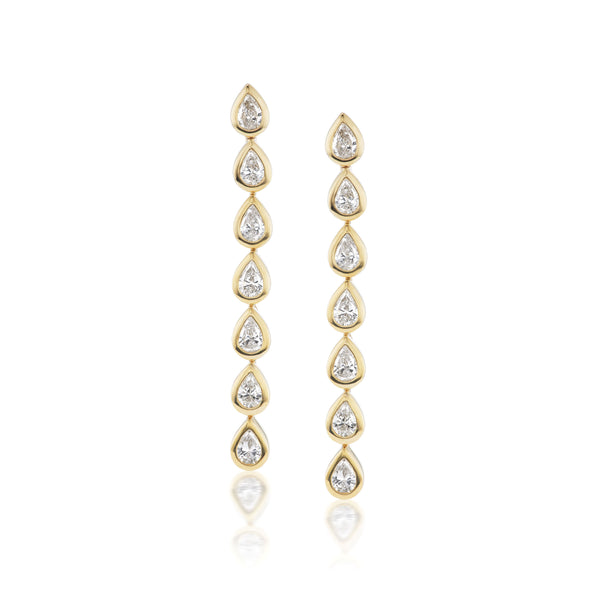 18k yellow gold bezel pear drop diamond earrings by Tiny Gods